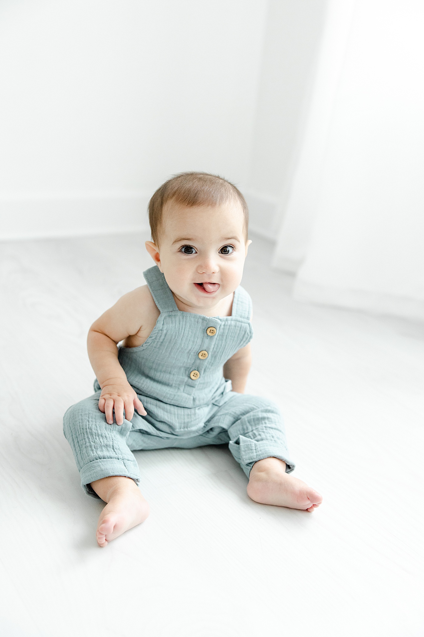 7 month old baby boy sitting for milestone session in studio in Westport, CT | Kristin Wood Photography