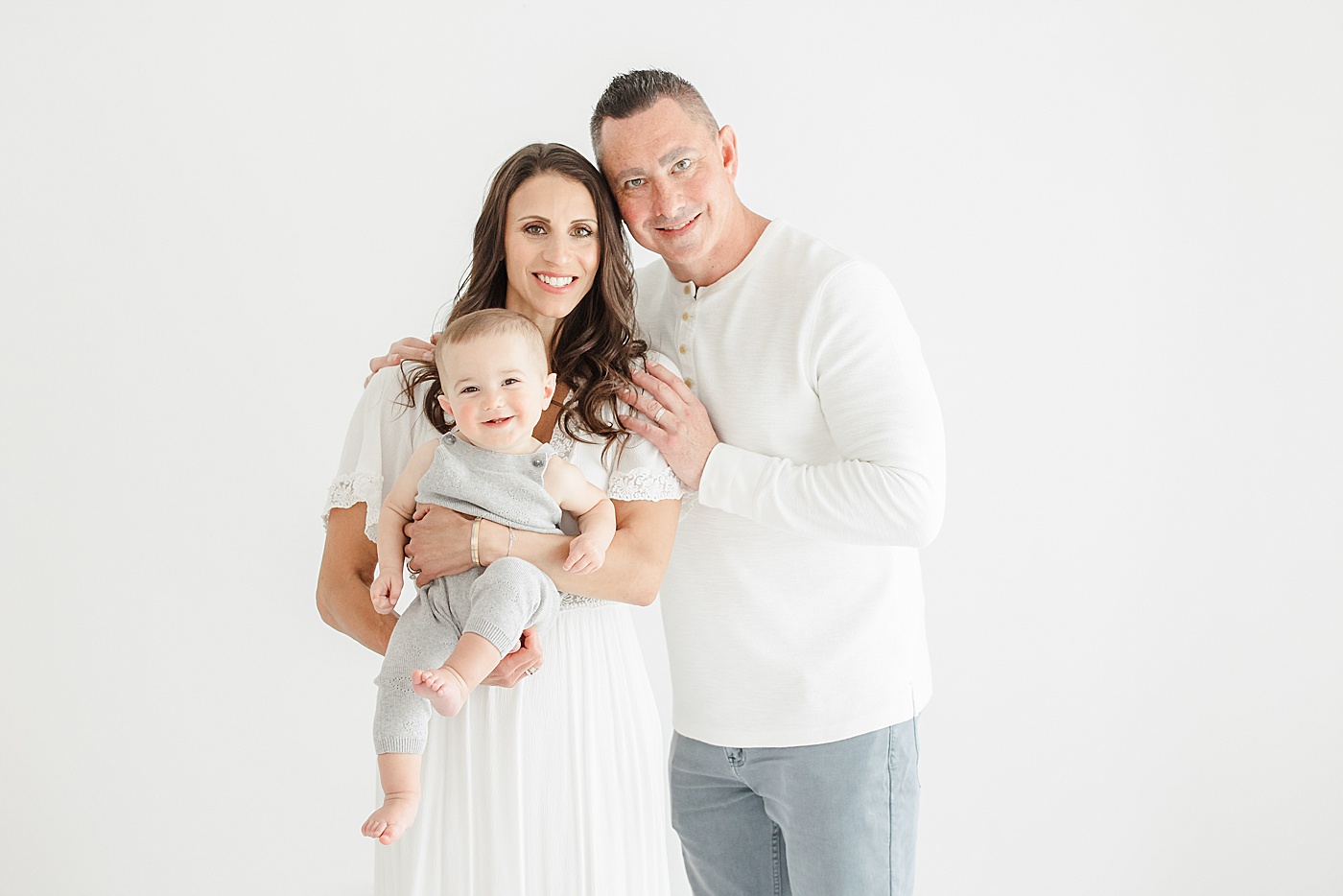 Family photos during sons first birthday session in studio with Kristin Wood Photography.