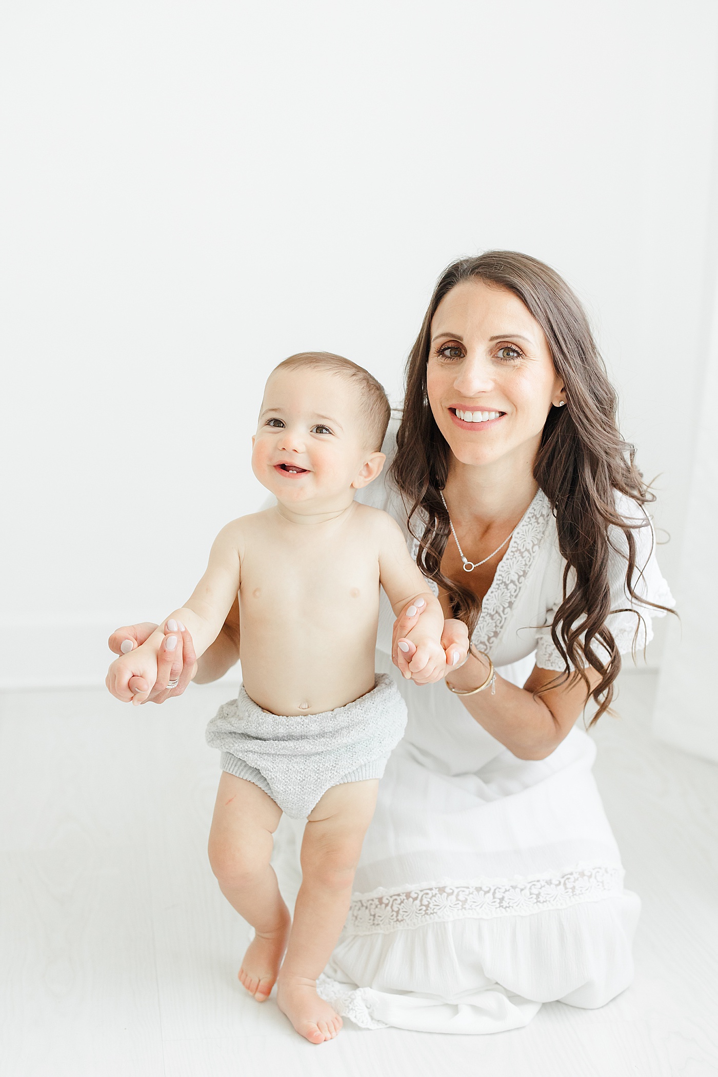 Mom and one year old son during photoshoot with Kristin Wood Photography to celebrate his first birthday.