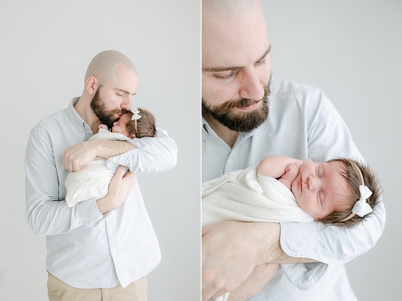 Proud Dad holding his newborn daughter | Kristin Wood Photography