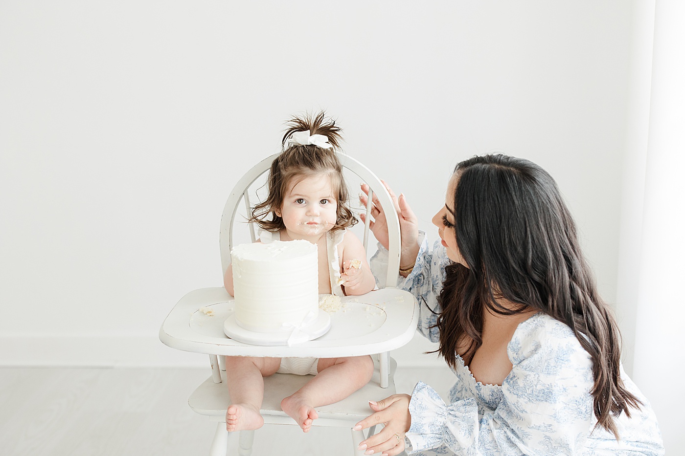Cake smash during first birthday session with Kristin Wood Photography.