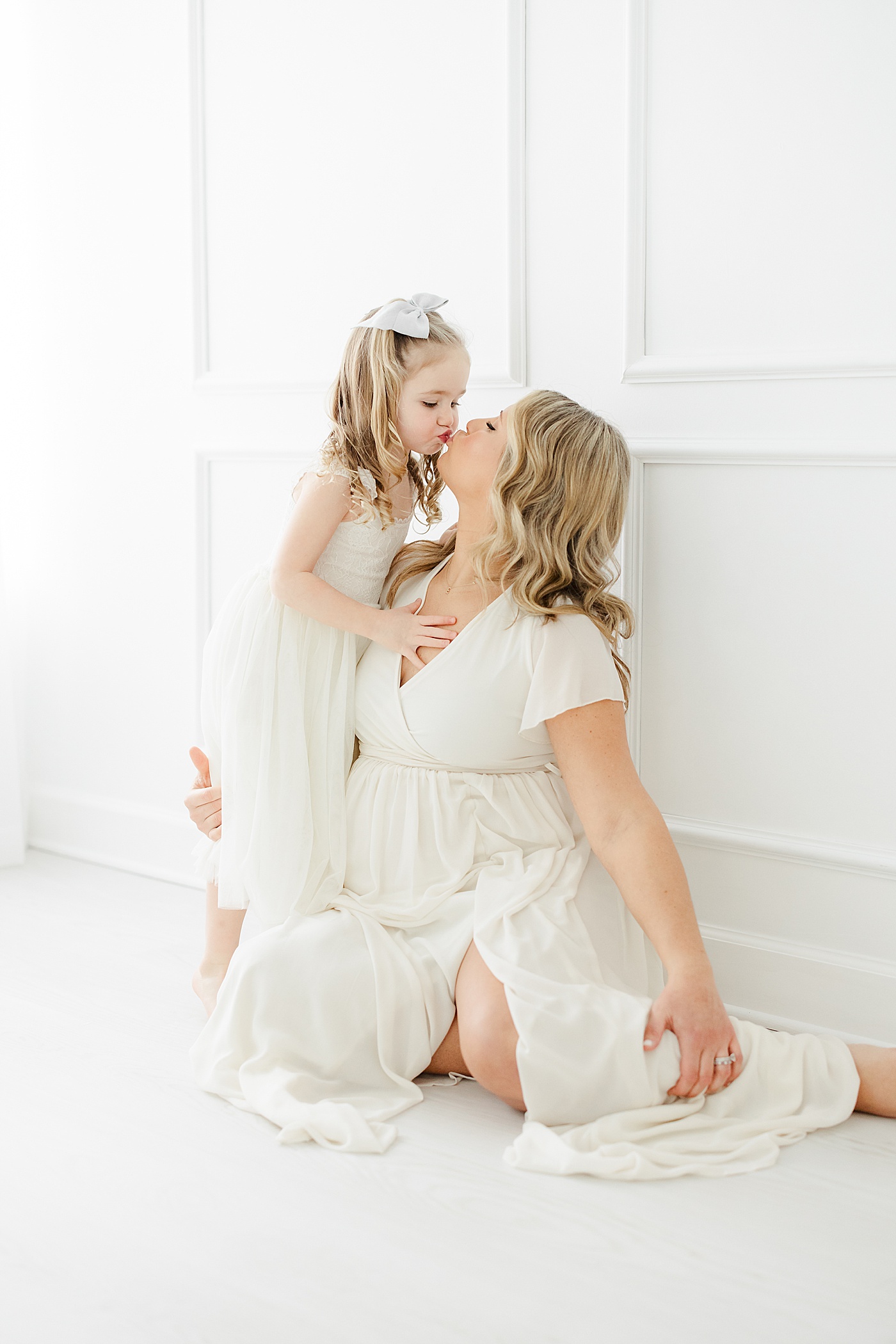 Mother-daughter studio maternity session with Kristin Wood Photography in Westport, CT.